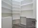Walk-in pantry with custom shelving and ample storage space at 2004 Plain Field Dr, Bessemer City, NC 28016