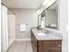 Spacious bathroom featuring a double vanity and a shower-tub combination at 201 S 5Th Ave, Maiden, NC 28650