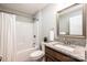 This bathroom features a shower-tub, granite countertop, and single vanity at 201 S 5Th Ave, Maiden, NC 28650