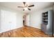 This bedroom has hardwood floors, double closets and custom built-in shelving at 201 S 5Th Ave, Maiden, NC 28650