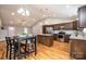 Beautiful kitchen with an island, stainless appliances, wood cabinets, and a dining table at 201 S 5Th Ave, Maiden, NC 28650
