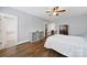 Cozy bedroom with hardwood floors, closet access, and ample natural light at 228 Coneflower Pl, Fort Mill, SC 29708