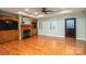 Spacious living room with fireplace, built-ins, and hardwood floors at 2817 Long Cir # 1, Iron Station, NC 28080