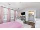 Bright bedroom boasts plenty of natural light, hardwood floors, and attached bathroom at 2945 Duvalla Ave, Charlotte, NC 28209