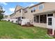 Backyard showing screened patio and fences providing privacy in a shared backyard at 3237 Yarmouth Ln, Gastonia, NC 28056