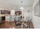Charming breakfast nook with a glass table set, open to the kitchen with stainless steel appliances and bar seating at 3237 Yarmouth Ln, Gastonia, NC 28056