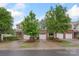 Attractive two-story townhome with a brick facade and a one-car garage at 3237 Yarmouth Ln, Gastonia, NC 28056