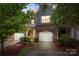 Charming two-story townhome with a brick facade and a one-car garage at 3237 Yarmouth Ln, Gastonia, NC 28056