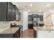 A kitchen with stainless steel appliances, granite countertops and a kitchen island at 3237 Yarmouth Ln, Gastonia, NC 28056