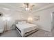 Serene main bedroom with neutral tones, featuring a cozy seating area and stylish decor at 3237 Yarmouth Ln, Gastonia, NC 28056