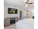 Main bedroom with ceiling fan, tv and electric fireplace. Has ensuite bathroom and walk-in closet at 3237 Yarmouth Ln, Gastonia, NC 28056