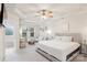 Spacious main bedroom with a tray ceiling, seating area, and ensuite bathroom entrance at 3237 Yarmouth Ln, Gastonia, NC 28056