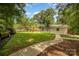 Spacious backyard featuring a playset, shed, and trampoline, great for outdoor activities at 3250 Celanese Rd, Rock Hill, SC 29732