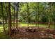 Large backyard with a fire pit and plenty of room for outdoor enjoyment at 3250 Celanese Rd, Rock Hill, SC 29732