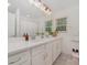 Bright bathroom featuring a double vanity with white cabinets and modern fixtures at 3250 Celanese Rd, Rock Hill, SC 29732
