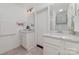 Bright bathroom featuring double vanity sinks, white cabinetry, and ample counter space at 3250 Celanese Rd, Rock Hill, SC 29732