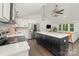 Stunning kitchen featuring a large island, stainless steel appliances, and stylish lighting fixtures at 3250 Celanese Rd, Rock Hill, SC 29732