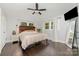 Relaxing primary bedroom with hardwood floors, two windows, and a comfortable atmosphere at 3250 Celanese Rd, Rock Hill, SC 29732