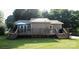 View of the back of the home with a spacious deck, perfect for outdoor entertaining and relaxation at 332 Daybrook Dr, Landis, NC 28088