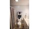 Well-lit bathroom featuring a toilet, sink and shower with new fixtures at 332 Daybrook Dr, Landis, NC 28088