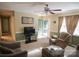 Inviting living room featuring neutral-toned walls, plush carpeting, and ample natural light at 332 Daybrook Dr, Landis, NC 28088