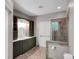Bathroom view displaying walk-in shower, unique cabinetry, and vanity at 3333 Roberta Rd, Concord, NC 28027