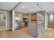 Kitchen with stainless steel appliances, wood cabinets, and decorative lighting at 3333 Roberta Rd, Concord, NC 28027