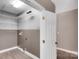 Spacious laundry room with built-in shelving and hookups for washer and dryer at 3333 Roberta Rd, Concord, NC 28027