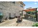 Spacious backyard patio featuring comfortable seating and barbecue area, ideal for outdoor living at 3340 Emerald Pointe Ct, Monroe, NC 28110