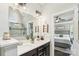 Modern bathroom featuring double vanity, a large mirror, and a tiled shower behind a glass door at 3340 Emerald Pointe Ct, Monroe, NC 28110