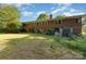 Spacious backyard with partial fence, mature trees and partial home view at 3420 Long Ferry Rd, Salisbury, NC 28146