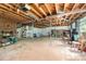 Spacious unfinished basement with exposed ceiling and brick fireplace at 3420 Long Ferry Rd, Salisbury, NC 28146