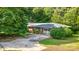 Charming single-story home with a two-car garage and a well-manicured front yard at 3420 Long Ferry Rd, Salisbury, NC 28146