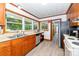 The kitchen has stainless appliances, a double sink, and vinyl floors at 3420 Long Ferry Rd, Salisbury, NC 28146