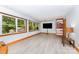 This living room has large windows, built-in shelving, and neutral walls at 3420 Long Ferry Rd, Salisbury, NC 28146