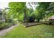 Garden backyard featuring a walking path, raised garden and metal fence at 40 Old Rd, Taylorsville, NC 28681