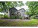Back of house featuring a deck, stairs, a grilling area and wooden privacy fence at 40 Old Rd, Taylorsville, NC 28681