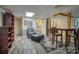 Finished basement space with stylish flooring, exposed beam, and open design at 40 Old Rd, Taylorsville, NC 28681