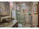 Stylish bathroom with glass-enclosed shower, modern vanity, and tile work at 40 Old Rd, Taylorsville, NC 28681