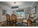 Elegant dining room features a decorative chandelier, neutral walls, and stylish table setting perfect for entertaining at 40 Old Rd, Taylorsville, NC 28681