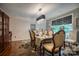 Elegant dining room with hardwood floors, stylish chandelier, and lots of light at 40 Old Rd, Taylorsville, NC 28681