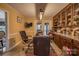 Cozy office space features wood cabinets, granite countertops, and a table perfect for work or study at 40 Old Rd, Taylorsville, NC 28681