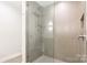 Modern bathroom features a walk-in shower with beautiful tile and glass door at 401 N Church St # 201, Charlotte, NC 28202