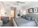 Bright bedroom features neutral decor and ample natural light at 401 N Church St # 201, Charlotte, NC 28202