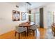Modern dining room featuring hardwood floors, modern lighting fixture and stylish furnishings at 401 N Church St # 201, Charlotte, NC 28202