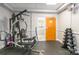 Gym featuring various workout equipment, weights, and rubber flooring at 401 N Church St # 201, Charlotte, NC 28202