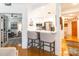 Bright, modern kitchen featuring breakfast bar, stainless appliances and open floorplan at 401 N Church St # 201, Charlotte, NC 28202