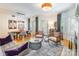 Inviting living room boasts hardwood floors, stylish furnishings, and access to outdoor patio at 401 N Church St # 201, Charlotte, NC 28202