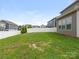 Spacious backyard with a well-maintained lawn and a white privacy fence at 4305 Twenty Grand Dr, Indian Trail, NC 28079