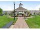 Charming community gazebo on a manicured lawn with benches at 4305 Twenty Grand Dr, Indian Trail, NC 28079